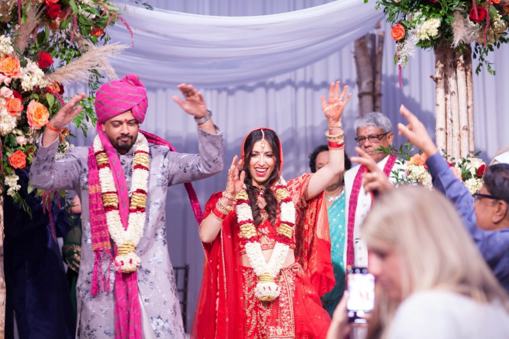 Alyssa and Shan in ceremonial attire at their Hindu wedding