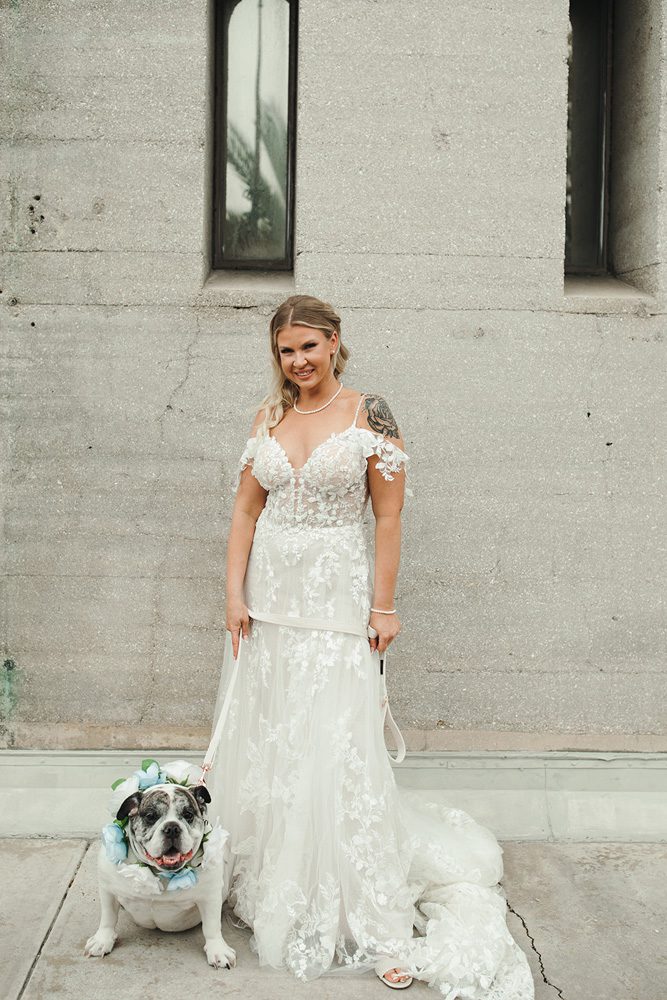 Bride poses with her dog