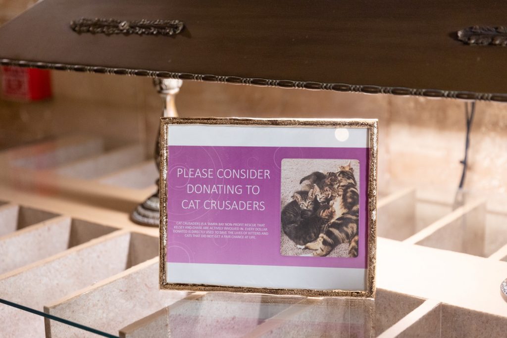 Sign asking guests to donate to local pet charity