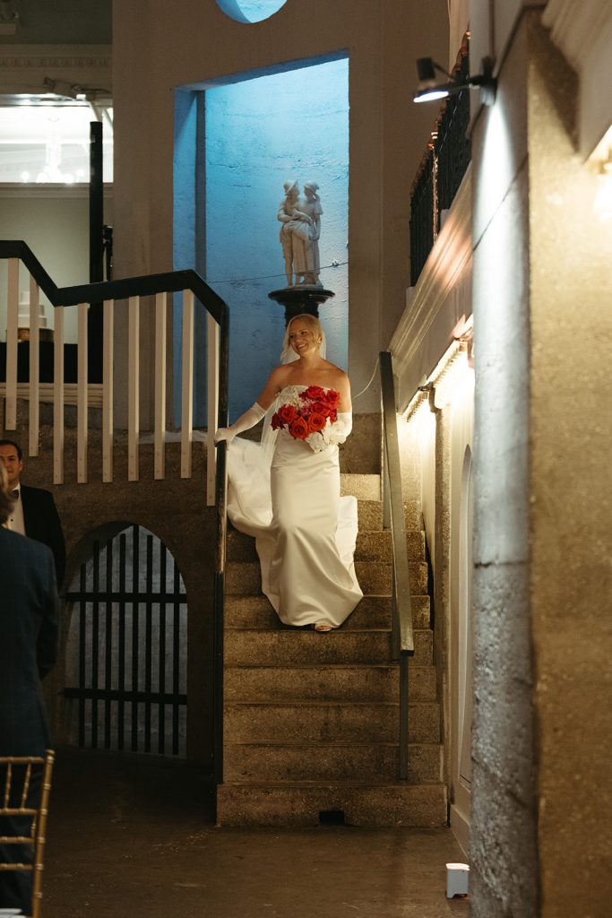 bride walking down the Mezzanine steps at the Lightner Museum