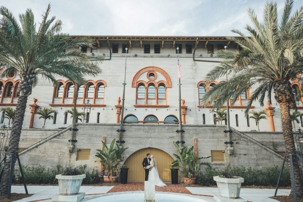 bride and groom in the courtyard at the Lightner Museum